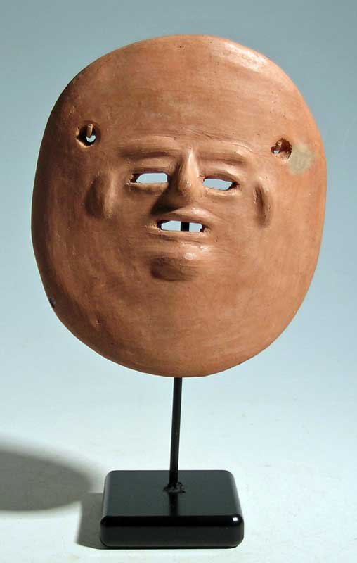 A rare Calima mask from the Valle Del Cauca: A rare Calima mask from the Valle Del Cauca, Colombia, ca. 1200 – 1600 AD. It is 4-5/8 in high and depicts a deceased ancestor. It was believed that these masks allowed the dead to look into the wor