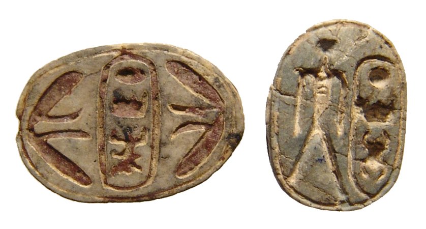 Pair Egyptian scarabs with cartouche of Thutmose III: A pair Egyptian scarabs with cartouche of Thutmose III, later New Kingdom, c. 1200 - 1075 BC, one of thin profile with cartouche between winged vultures, 17 x 13mm, the second with nicely carved body 