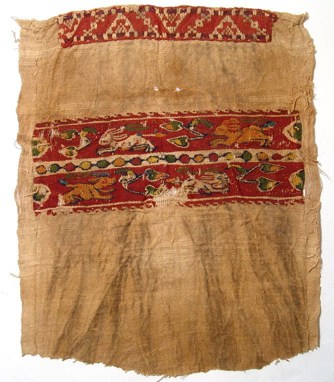 A colorful Coptic textile panel with running animals (1 of 3)