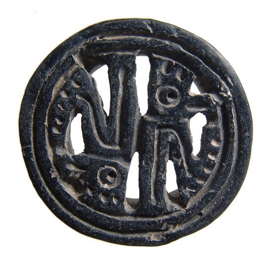 A choice Pre-Columbian ceramic ear spool (1 of 3)