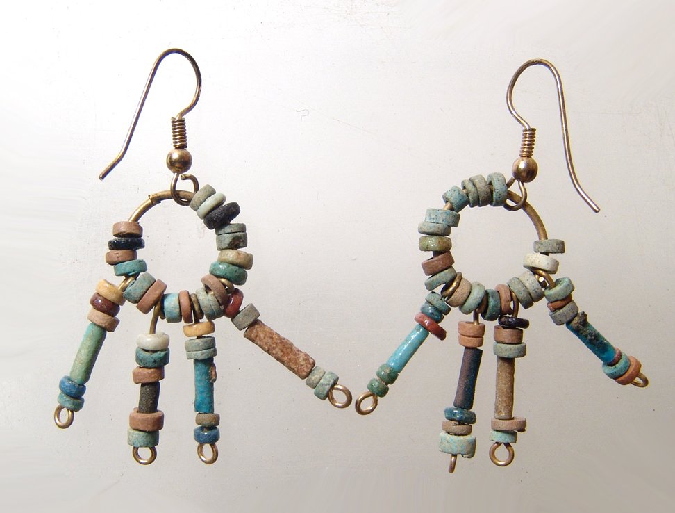 Pair of Egyptian bead earrings, made in precise ancient: A pair of Egyptian bead earrings, made in precise ancient style. The beads, Late Period, c. 664 – 30 BC, are of the multicolored faience variety, well preserved and placed onto the earrings with mod