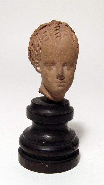 A Hellenistic terracotta head of a young woman (1 of 4)