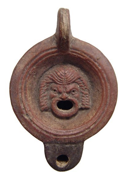 A choice Roman ceramic lamp with theatre mask (1 of 3)