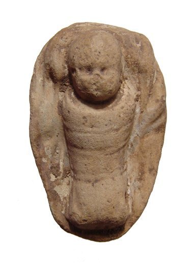 Greek terracotta swaddled baby, c. 3rd - 2nd Century BC: A Greek terracotta swaddled baby, c. 3rd - 2nd Century BC, the infant is tightly wrapped and resting in a cradles, a blanket around it. A scarce and interesting piece! L: 2 1/4 in (5.7cm). Intact, lig