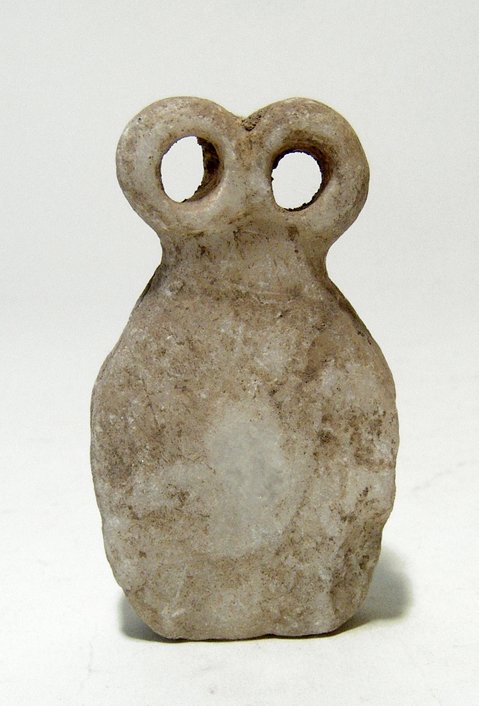 A large Tell Brak plank 'Eye' Idol, c. 3300 BC (1 of 2)