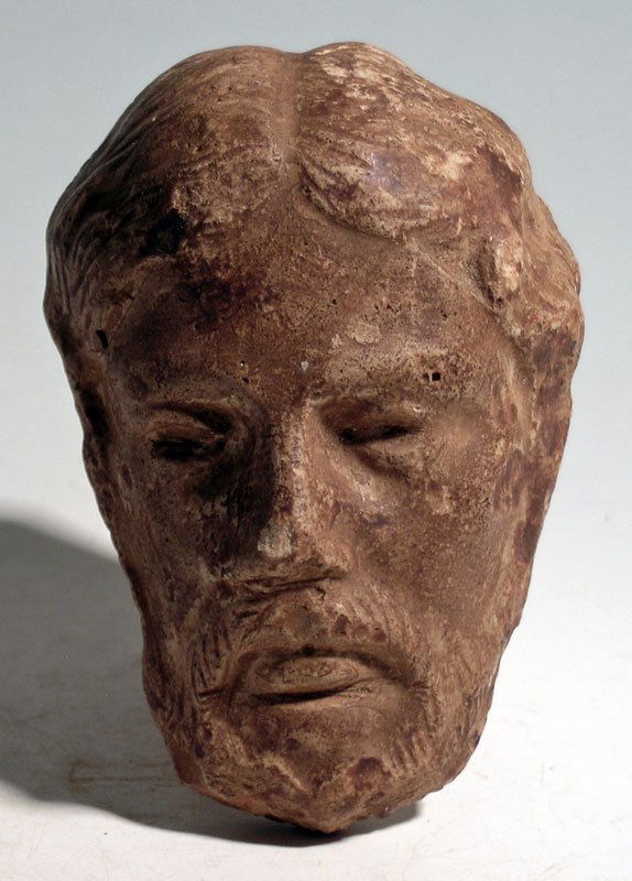 Pottery attachment of a the head of a bearded man, ca (1 of 5)