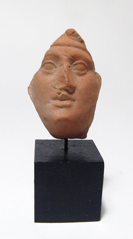 A nice Greek terracotta female face (1 of 4)