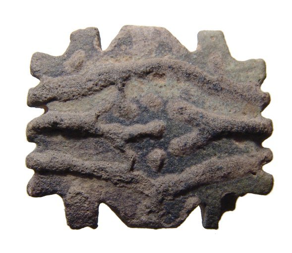 Egyptian bicolor faience quadruple Eye of Horus amulet: An Egyptian bicolor faience quadruple Eye of Horus amulet, 3rd Intermediate Period, c. 1075 - 664 BC, with traces of green glaze and black cosmetic details, mineral deposits throughout. 3 x 3.5 cm, ho