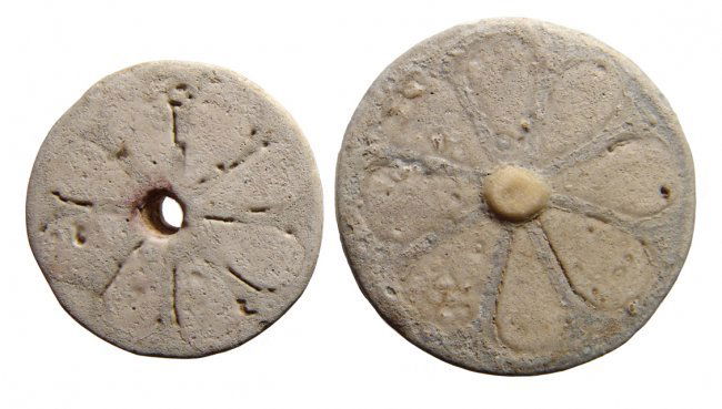 A pair of Egyptian faience floral inlays, c. 1075 – 332 (1 of 2)