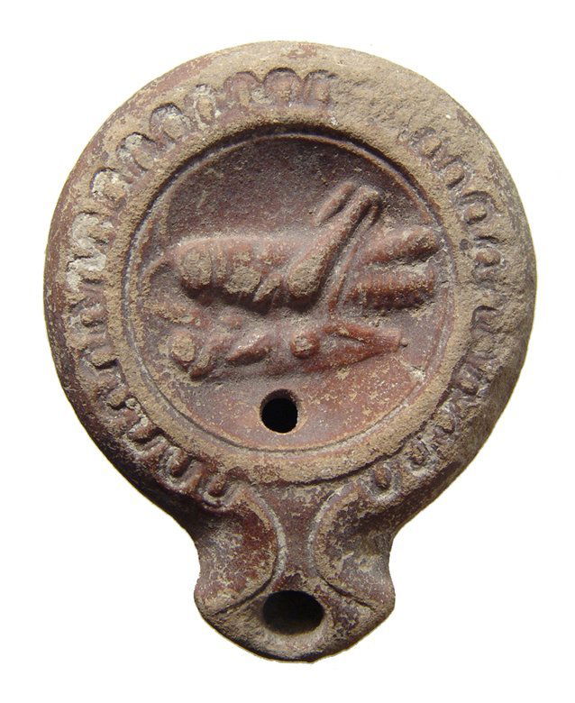 Roman ceramic lamp depicting a grasshopper in the (1 of 2)