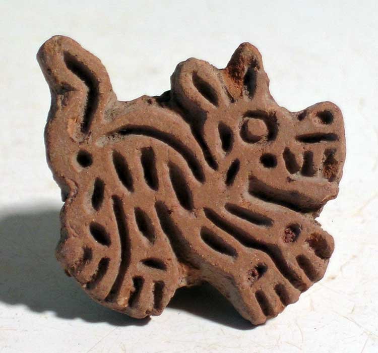 An excellent stamp from Vera Cruz, Mexico: An excellent stamp from Vera Cruz, Mexico, ca. 100 – 750 AD. This superbly detailed example is 1-3/8 in long and depicts Itzcuintli, the dog. In perfect condition, good mineral deposits. Ex Foxworth