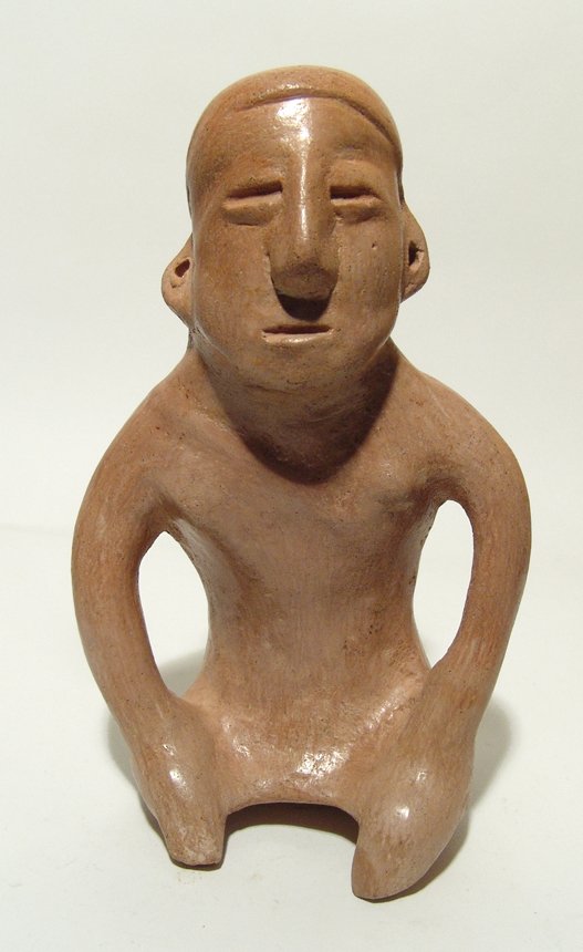 A large Colima figure of a seated woman (1 of 3)