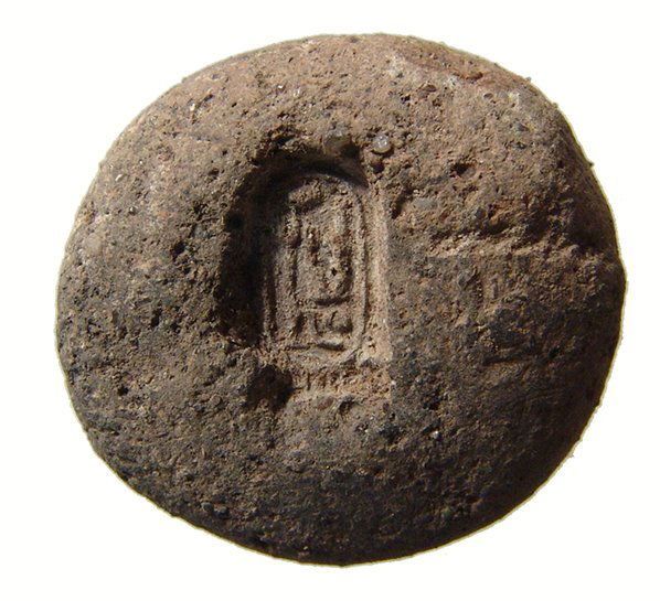 Egyptian mold for a bed with cartouche of Ramses II: A choice Egyptian mold for a bed with cartouche of Ramses II, c. 1279 – 1075 BC, with nearly perfectly preserved characters. Would have produced beads or ring bezels with pharaoh’s name which were