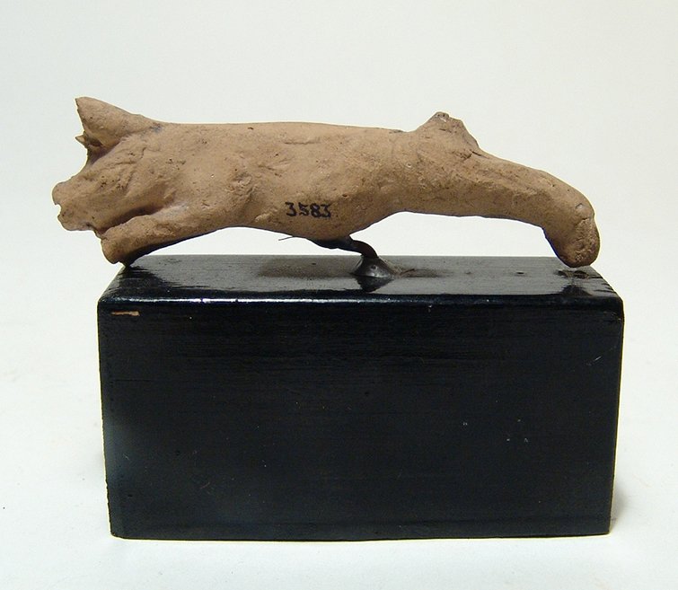 Greek terracotta figure of a running boar (1 of 2)