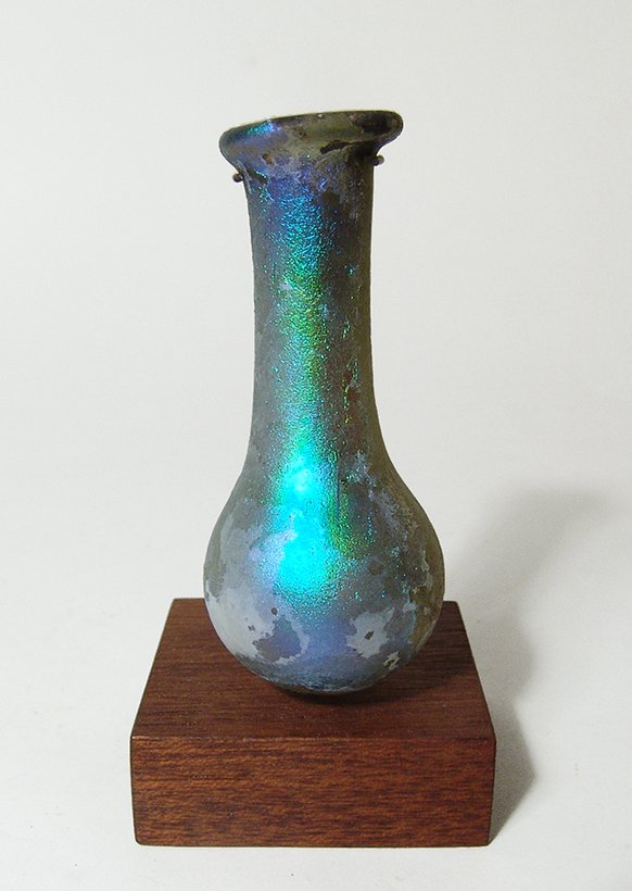 A gorgeous Roman yellow-green glass bottle (1 of 5)