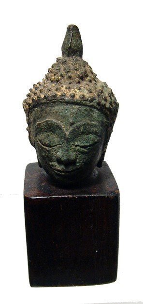 A gilded bronze head of Buddha (1 of 3)