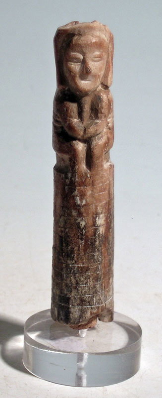 An excellent Tumaco bone idol from Colombia: An excellent Tumaco bone idol from Colombia, ca. 300 BC - 400 AD. It is 3-3/4 in high and depicts a seated shaman. Nicely carved and detailed, heavy mineral deposits, mounted on stand. Ex New World Ar