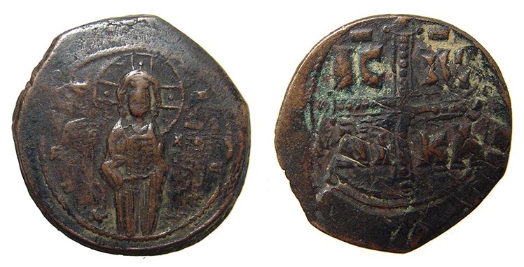 A large Byzantine coin depicting Christ, Michael IV: A large Byzantine coin depicting Christ, attributed to Michael IV, AD 1034 – 1041, the obverse depicts the three-quarter length figure of Christ with numbus, the back with IC-XC NI-KA within the ang