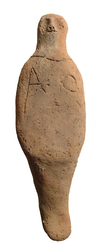 An interesting Egyptian terracotta ushabti: An interesting Egyptian terracotta ushabti, Late New Kingdom, c. 1200 - 1075 BC, from the territories in Israel and Jordan most likely, the body mummiform but without headdress, the features nicely mo