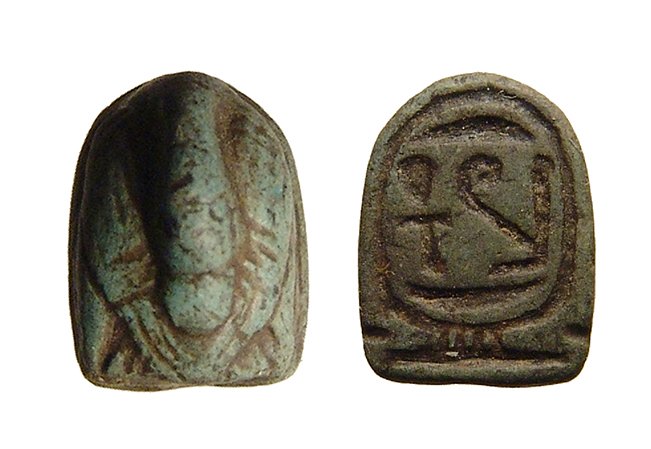 Egyptian blue faience scaraboid in the form of a duck: An Egyptian blue faience scaraboid in the form of a duck, New Kingdom, c. 1570 – 1075 BC, the body nicely detail showing feathers in relief, the head turned back over the body in classic Near Easter