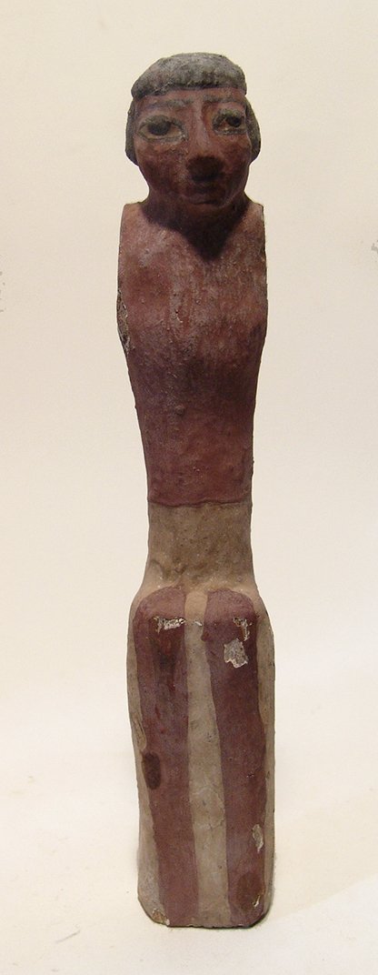 An Egyptian wooden figure, Middle Kingdom (1 of 4)