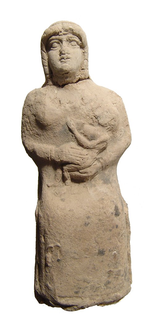 A beautiful Old Babylonian terracotta seated woman: A beautiful Old Babylonian terracotta seated woman, c. 1900 – 1750 BC, the goddess sits on her throne suckling an infant in the manner of the goddess Isis who suckles the young god Horus, who she cr