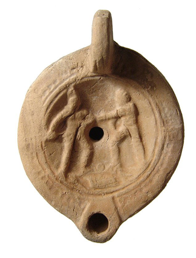 Roman oil lamp depicting a pair of armored figures (1 of 4)