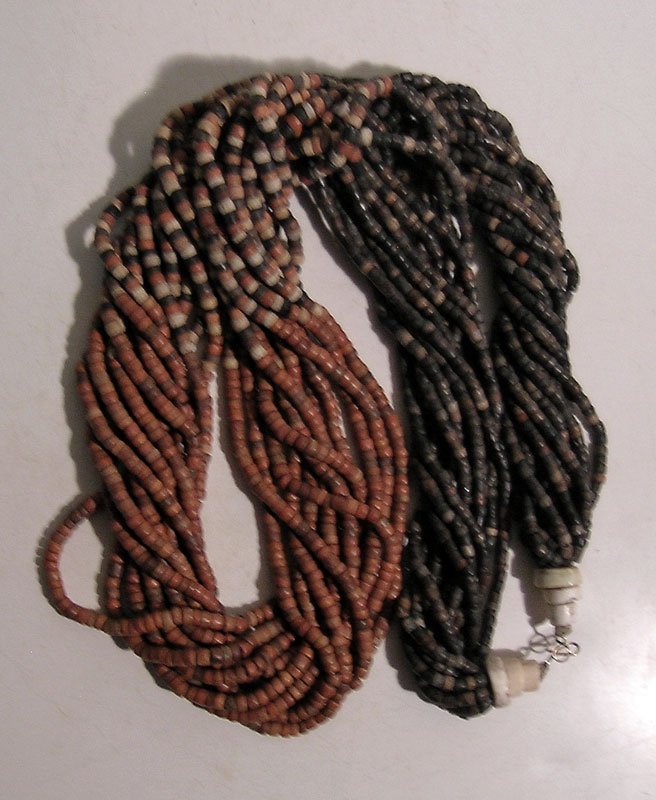 Gorgeous Sinu bead necklace from Colombia: A gorgeous Sinu bead necklace from Colombia, ca. AD 1000 – 1500, consisting of 12 strands of colored stone and ceramic beads in a wide range of shades from black to red. Bone beads are used to creat
