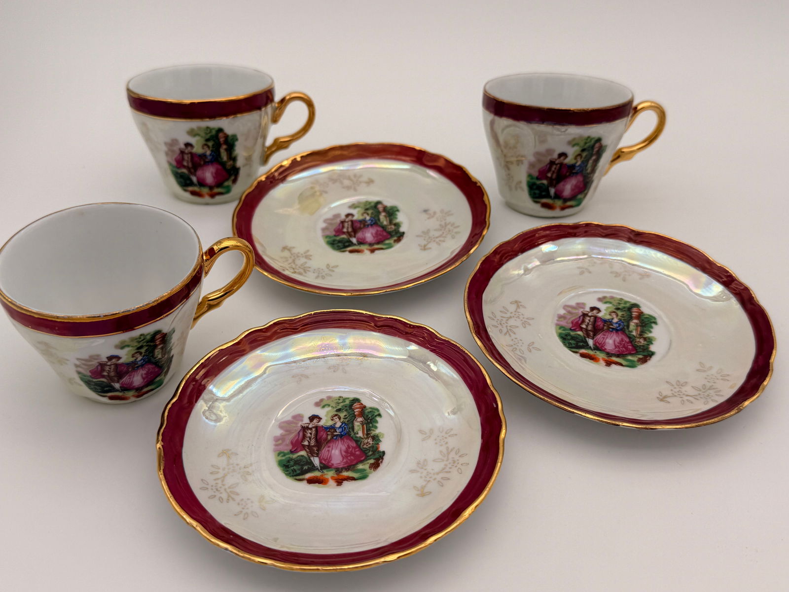 Set of 3 Fine Porcelain Courting Couple Teacup & Saucer Sets