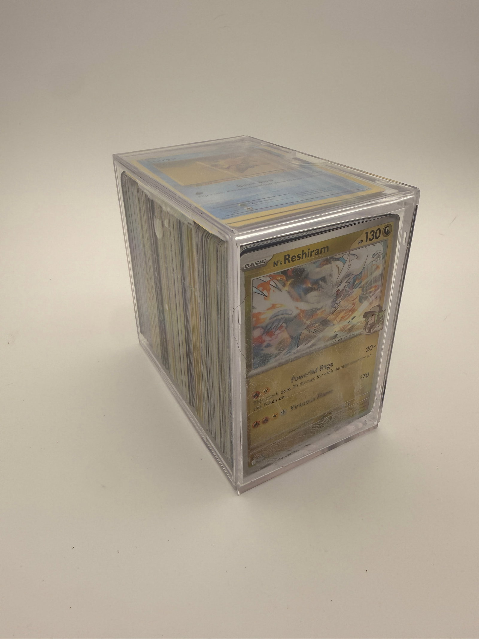 200 Random POKÉMON CARDS: 200 random Pokémon cards in a plastic case - unchecked.