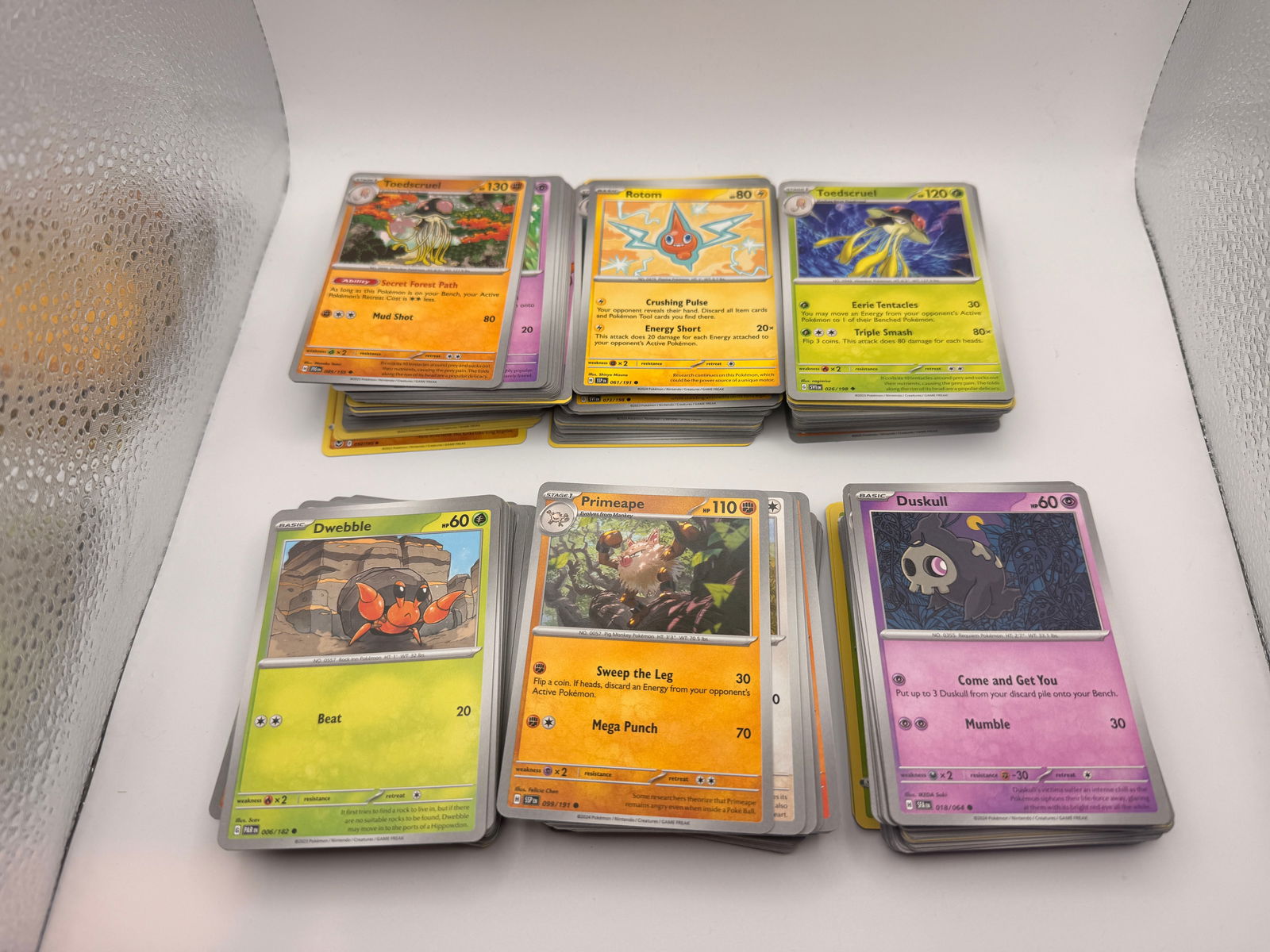 300+ Lot of Random Pokemon Cards Unchecked: Mixed lot of over 300 modern Pokémon Trading Card Game cards. Suitable for collectors or resellers.