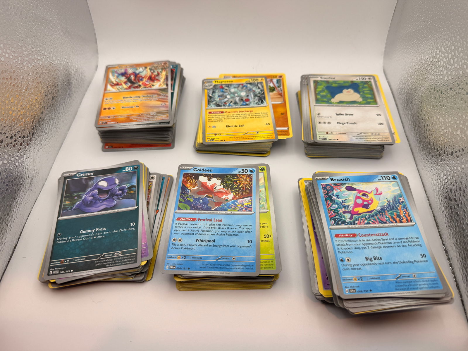 300+ Lot of Random Pokemon Cards Unchecked: Mixed lot of over 300 modern Pokémon Trading Card Game cards. Suitable for collectors or resellers.