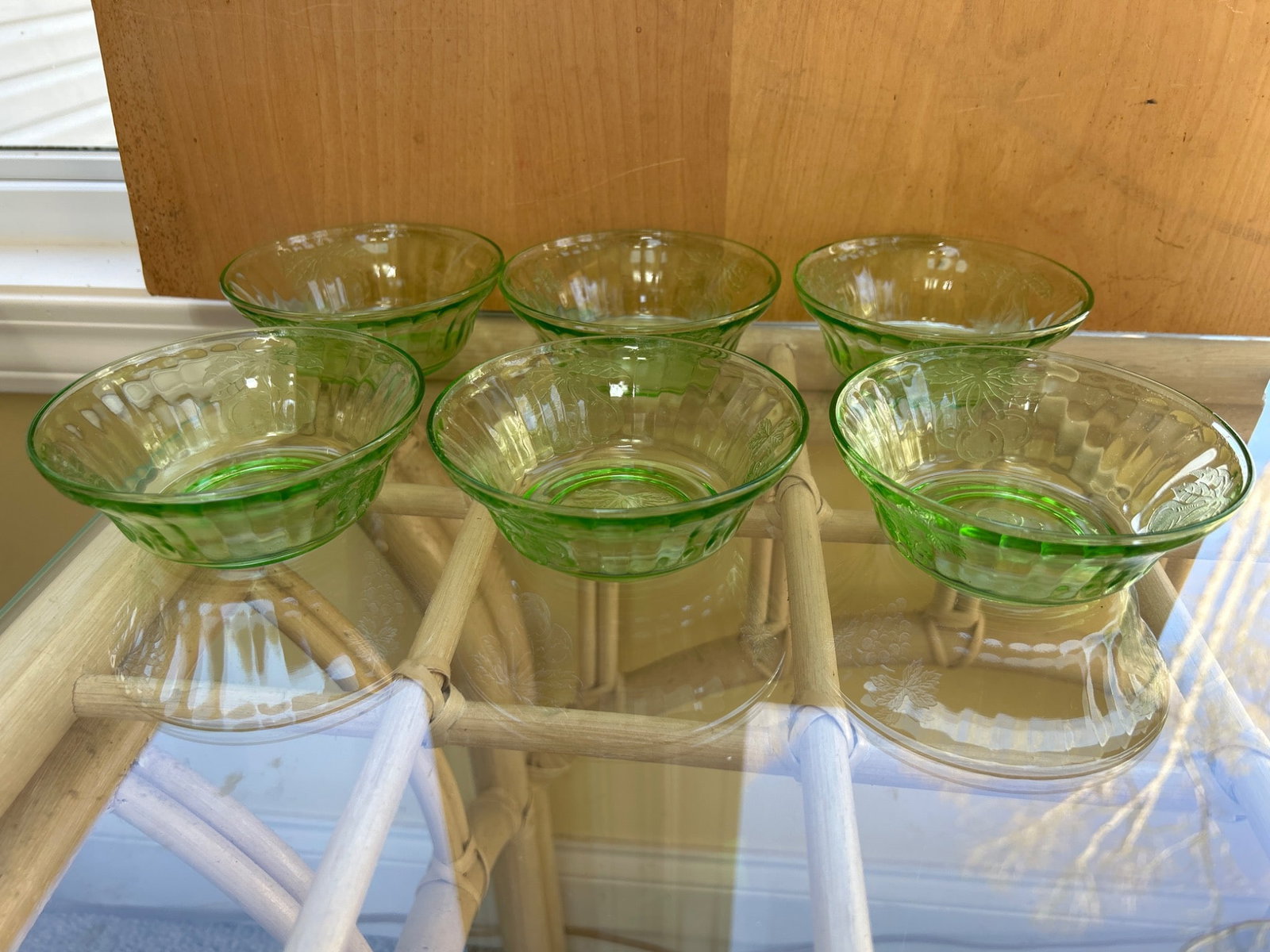 6 Green Depression Glass Bowls with Etched Cherry Design: This is a set of six green depression glass bowls featuring an etched cherry design on the base. The bowls have a scalloped edge and paneled sides, with each bowl measuring approximately 4 to 5
