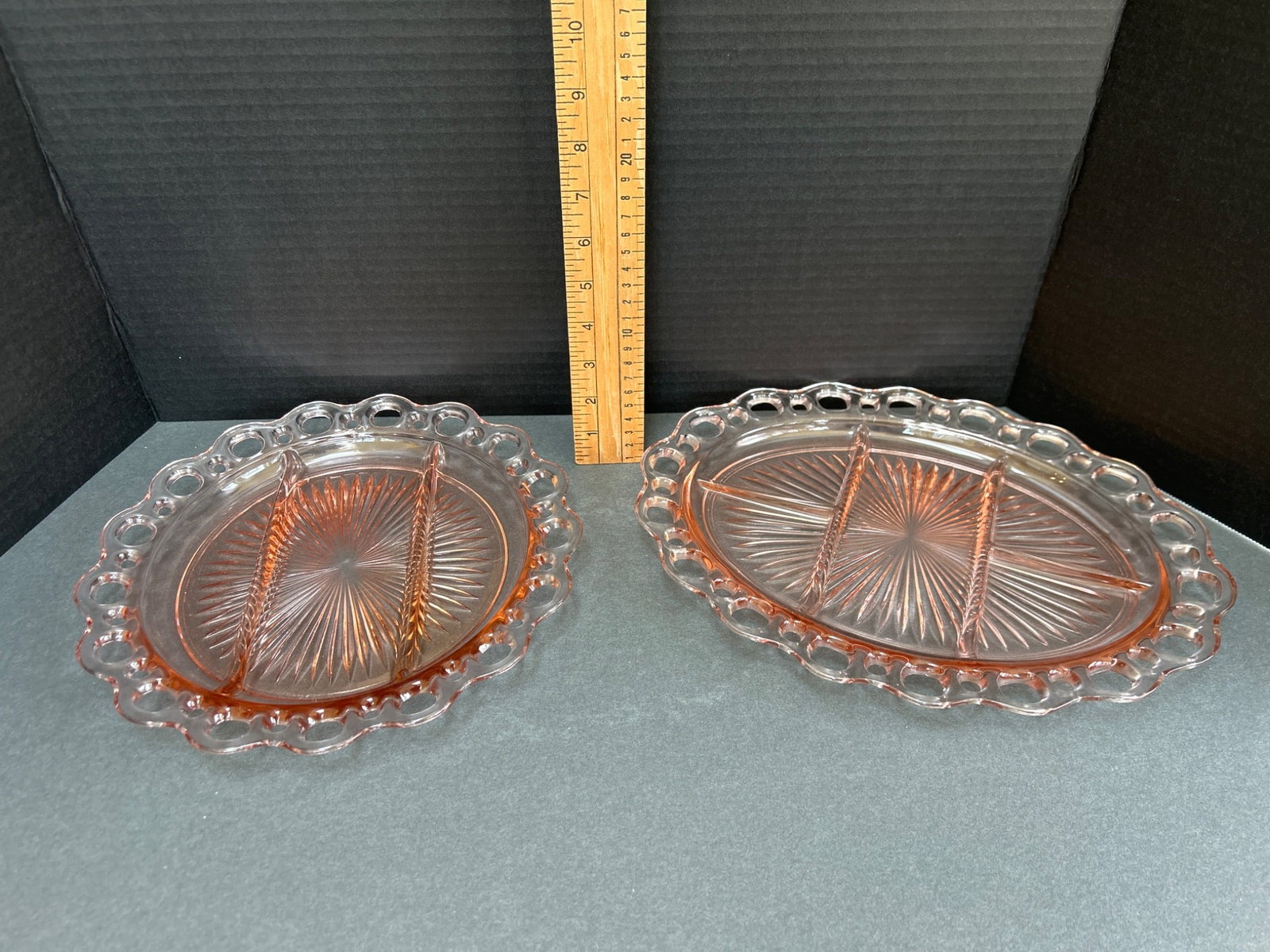 Two Divided Glass Serving Trays with Lace-Style Rims: This set includes two divided glass serving trays, one oval and one round, with a lace-style rim design. The trays measure approximately 11 inches and 10 inches in length, respectively, and feature a