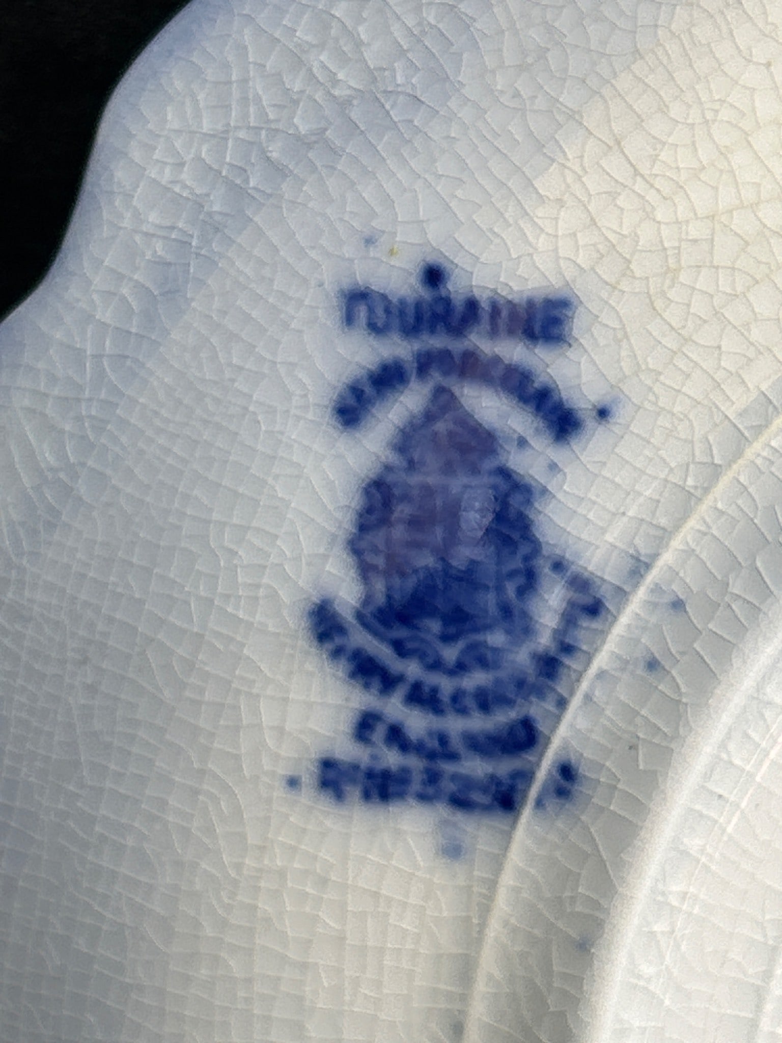 Flow Blue Porcelain Plate with Gold Trim and Decorative Motifs - 4