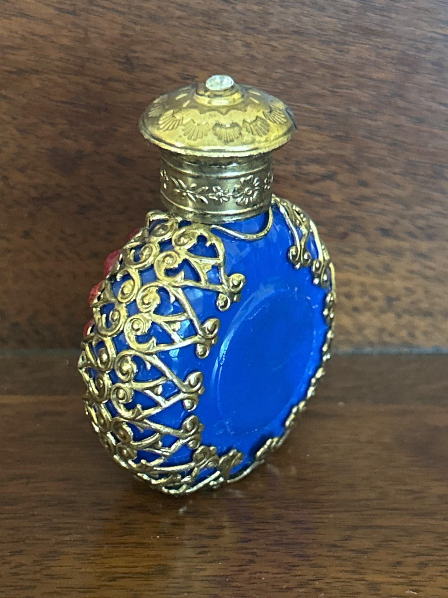 Blue Glass Perfume Bottle With Ornate Metal and Rhinestone Overlay - 2