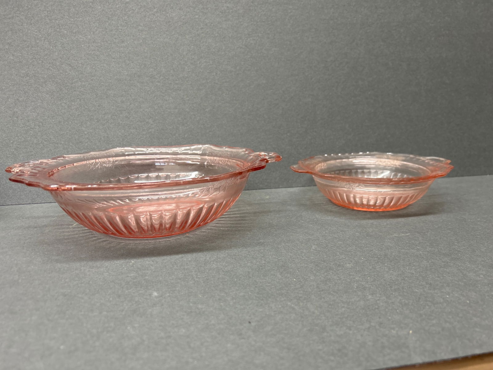Two Pink Depression Glass Bowls with Floral Pattern and Handles - 2