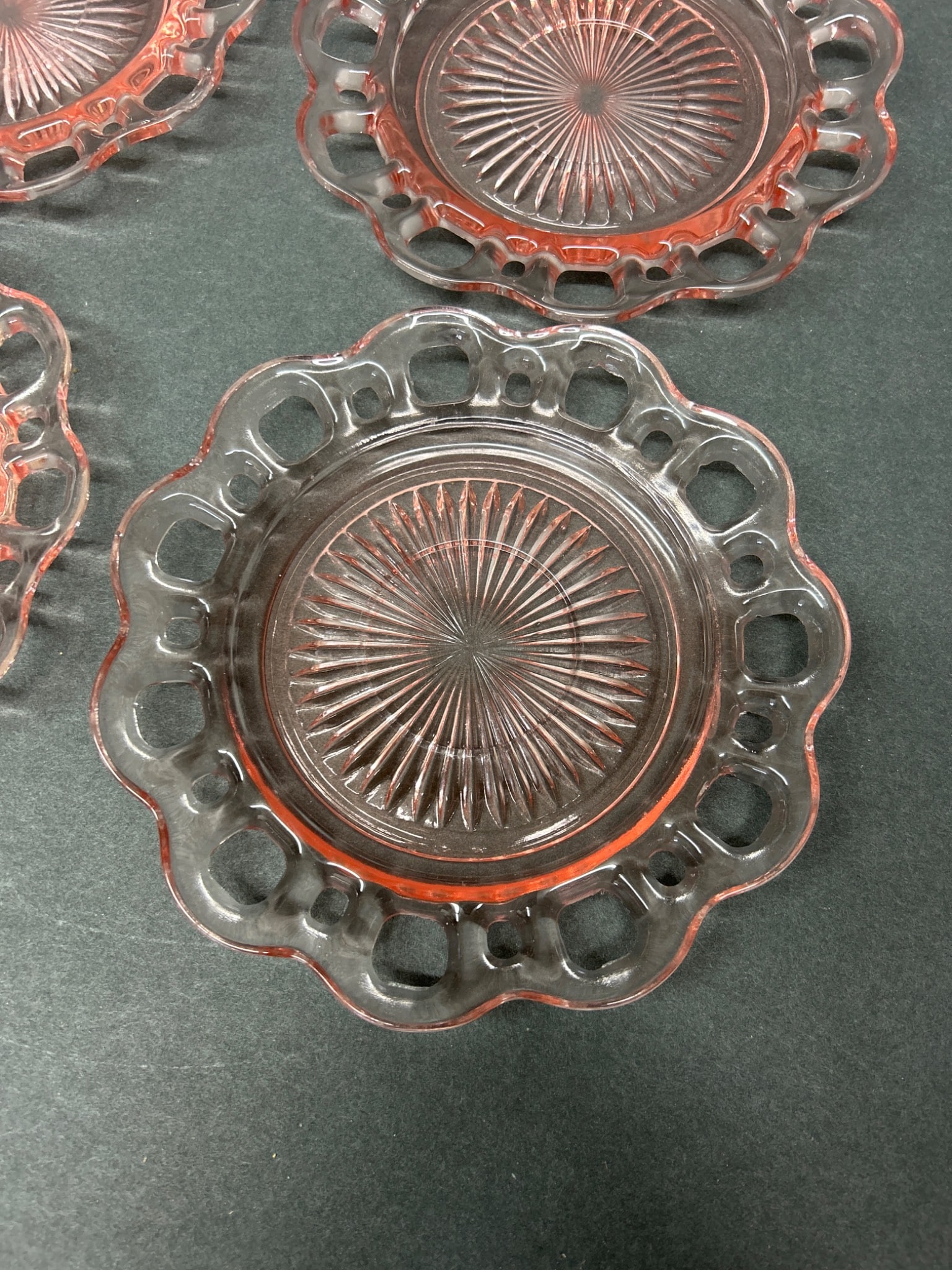 Four Pink Glass Plates with Laced Border and Sunburst Design - 2