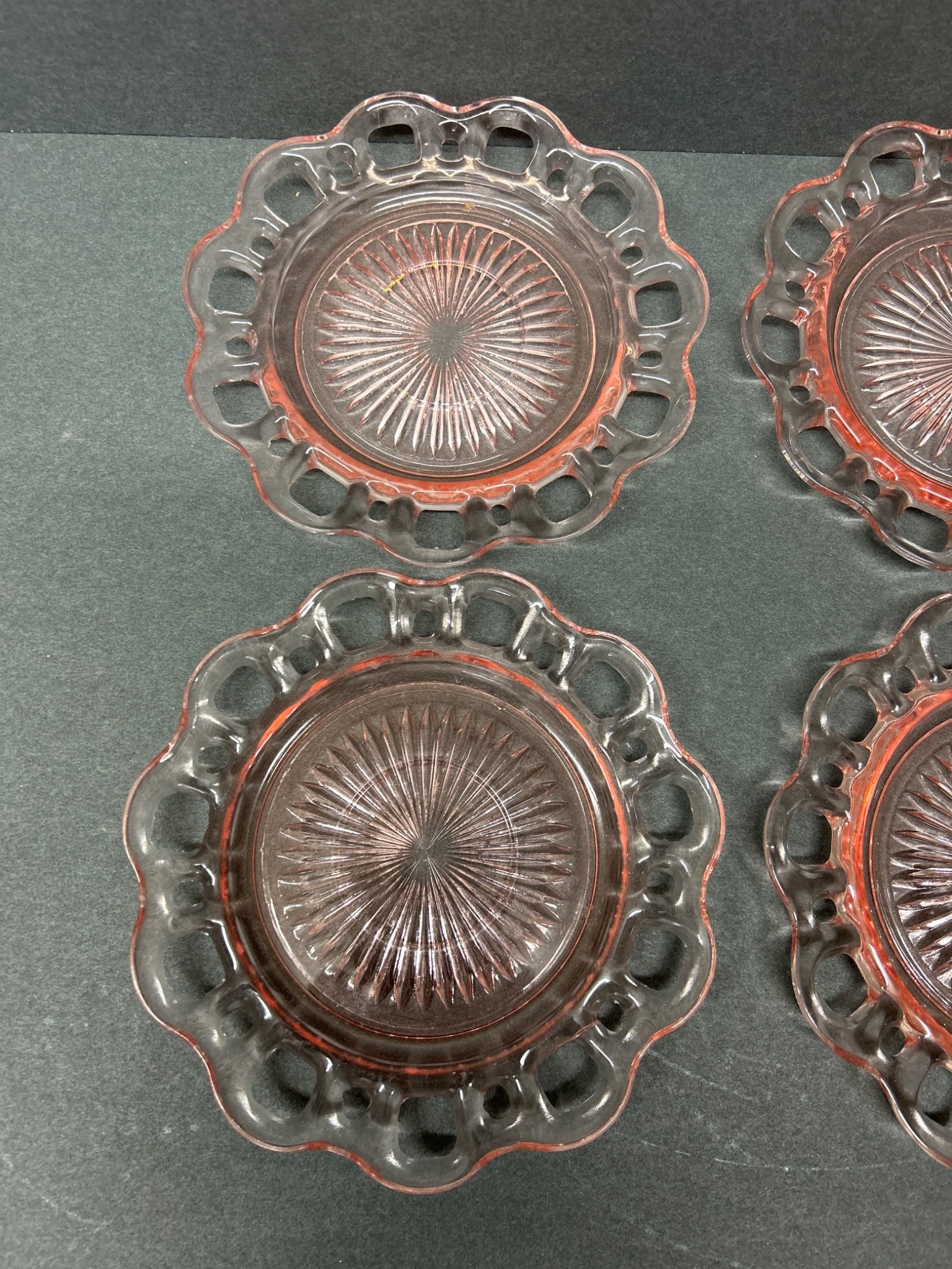 Four Pink Glass Plates with Laced Border and Sunburst Design - 4