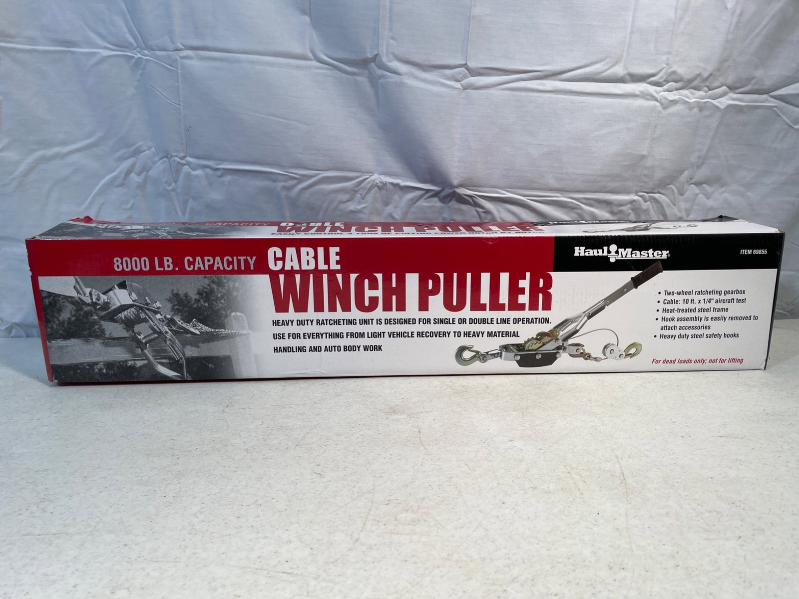 Heavy-Duty 8000 Lb. Capacity Cable Winch Puller by Metal Mulisha - Model MW-1338: This is a sealed and new heavy-duty cable winch puller with an 8000 lb. capacity, manufactured by Metal Mulisha, model number MW-1338. It is designed for lifting or pulling heavy loads and includes