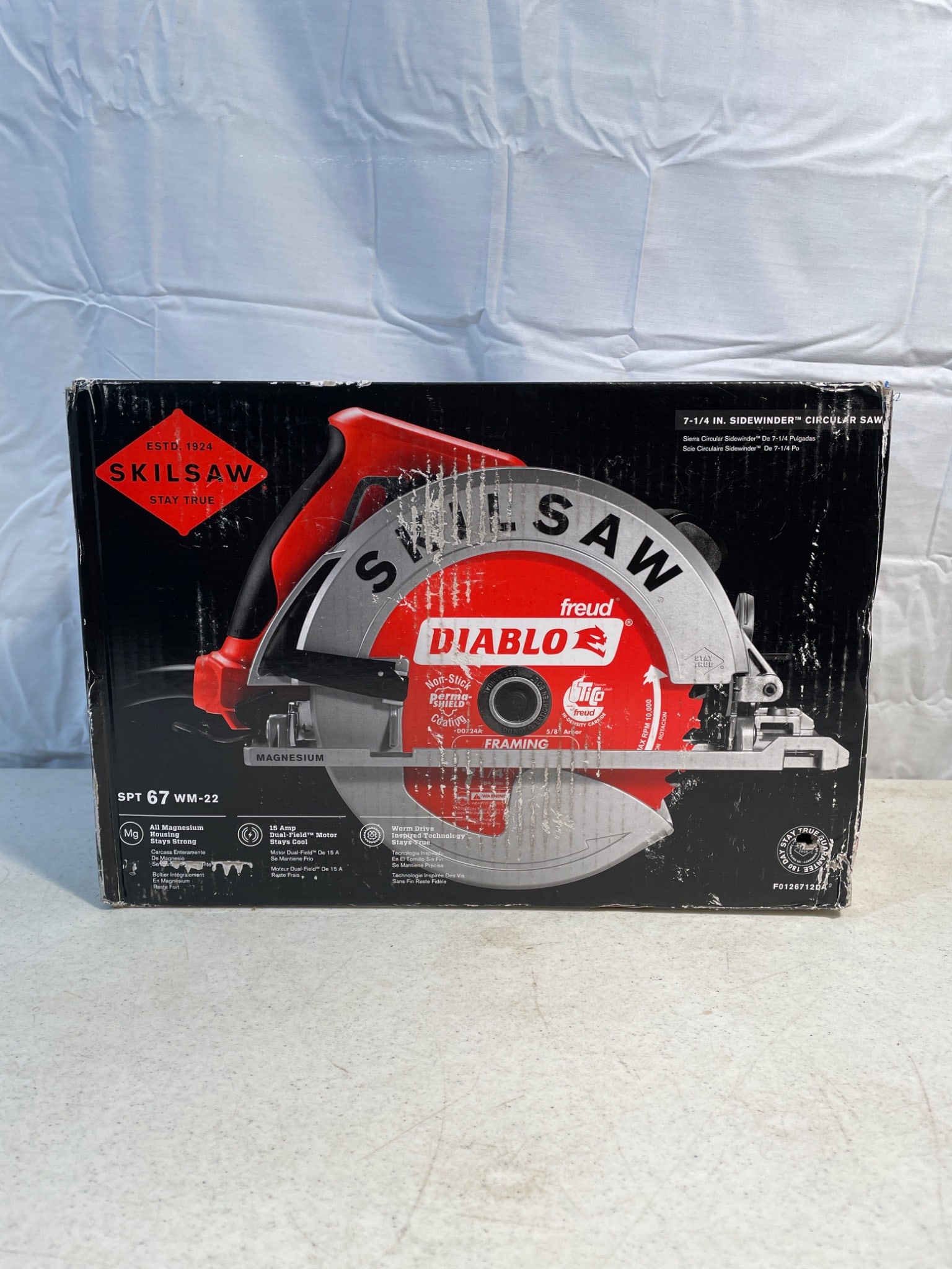 Skilsaw SPT67WM-22 7-1/4 Inch Circular Saw With Diablo Blade: New in the box, this Skilsaw SPT67WM-22 circular saw features an all-magnesium housing for durability and a 15-amp Dual-Field motor for cooler operation. It includes a Diablo blade and offers worm dri