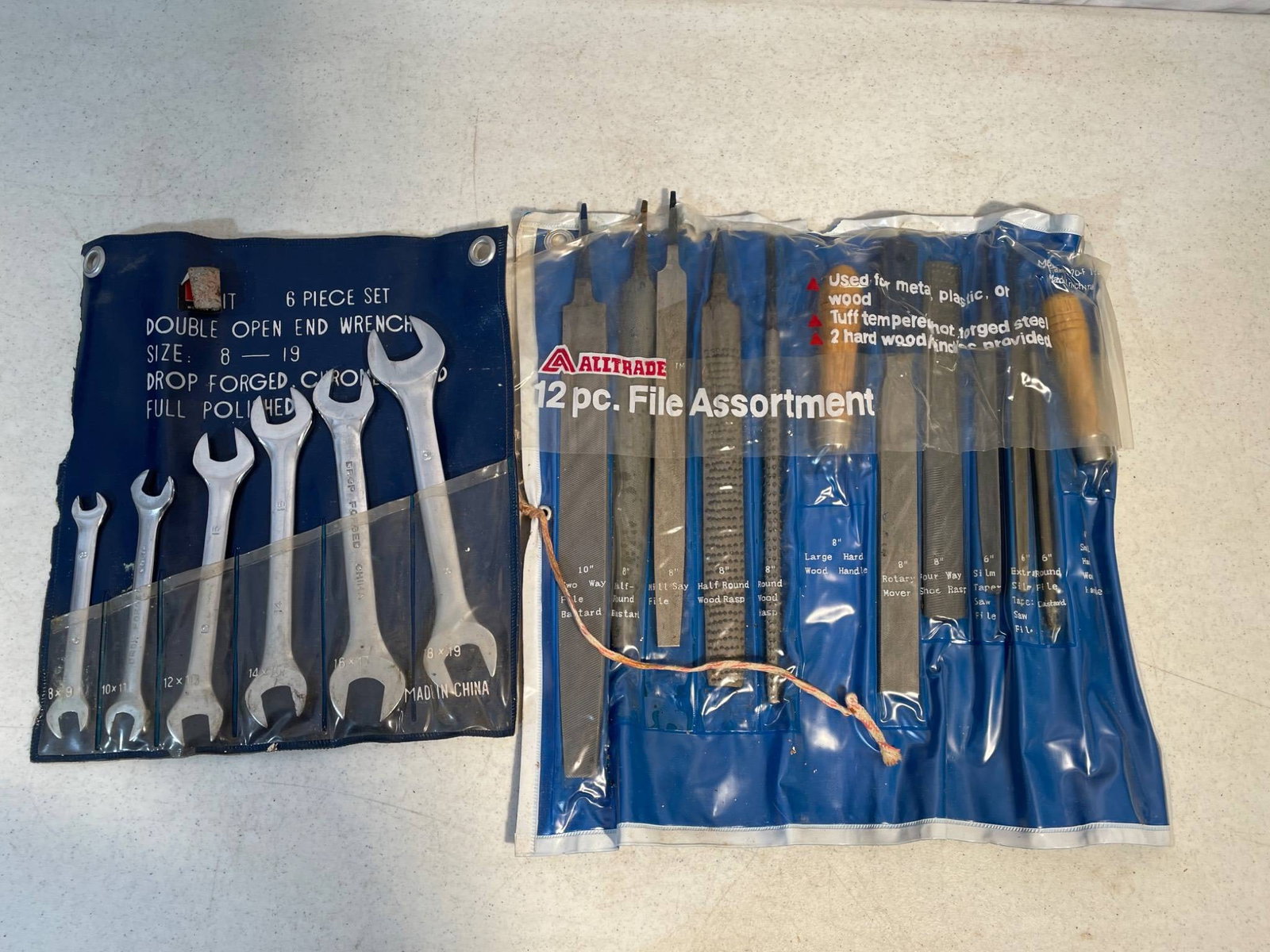 Combination of 6-Piece Double Open-End Wrench Set and 12-Piece File Assortment: This lot includes a 6-piece double open-end wrench set by ST, model CR-V8-19, made of drop-forged chrome and fully polished, with sizes ranging from 8 to 19 mm. Also included is a 12-piece file assort