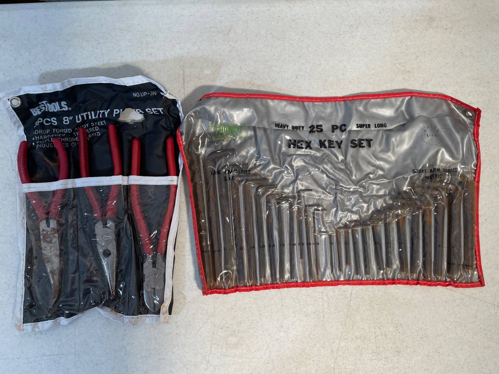 Bestools 3-Piece 8-Inch Utility Plier Set and 25-Piece Hex Key Set: This lot includes a Bestools No.UP-3N 3-piece 8-inch utility plier set featuring drop-forged carbon steel construction and plastic-dipped handles, and a 25-piece hex key set with varying sizes. Both