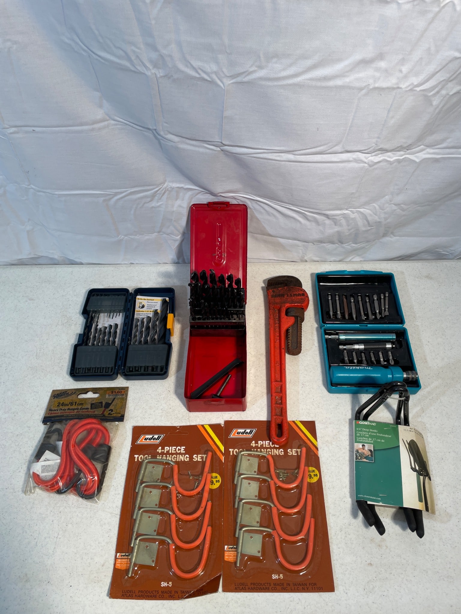 Tools Including Drill Bit Sets, Pipe Wrench, and Bungee Cords (1 of 4)