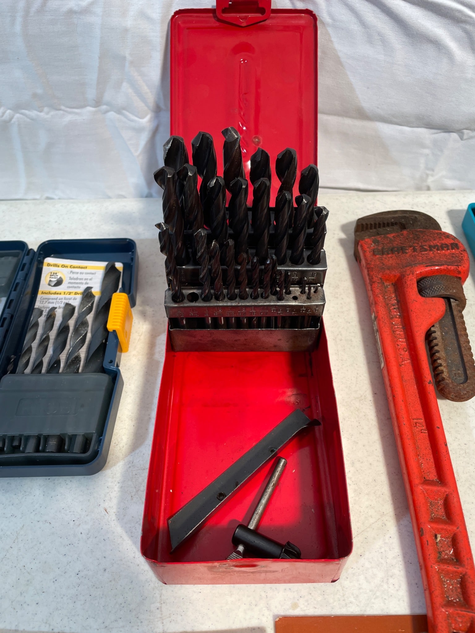 Tools Including Drill Bit Sets, Pipe Wrench, and Bungee Cords - 3