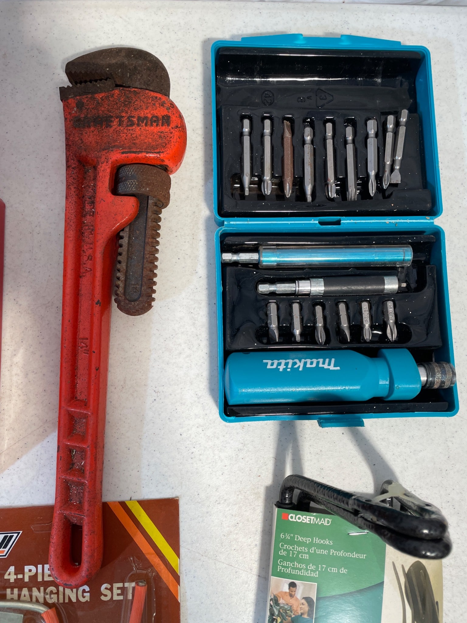 Tools Including Drill Bit Sets, Pipe Wrench, and Bungee Cords - 4