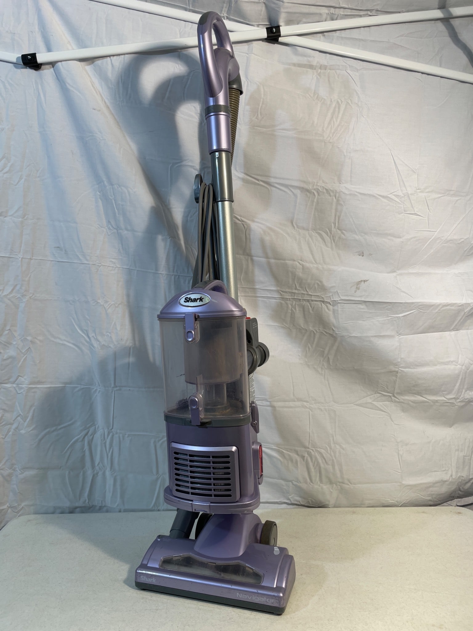 Shark Navigator NV350 Vacuum Cleaner in Purple: This is a Shark Navigator vacuum cleaner, model NV350W, designed for household use. The unit operates at 120 V, 60 Hz, 10 A and is compliant with UL Std. No. 1017 and CSA Std. C22.2 No. 243. It