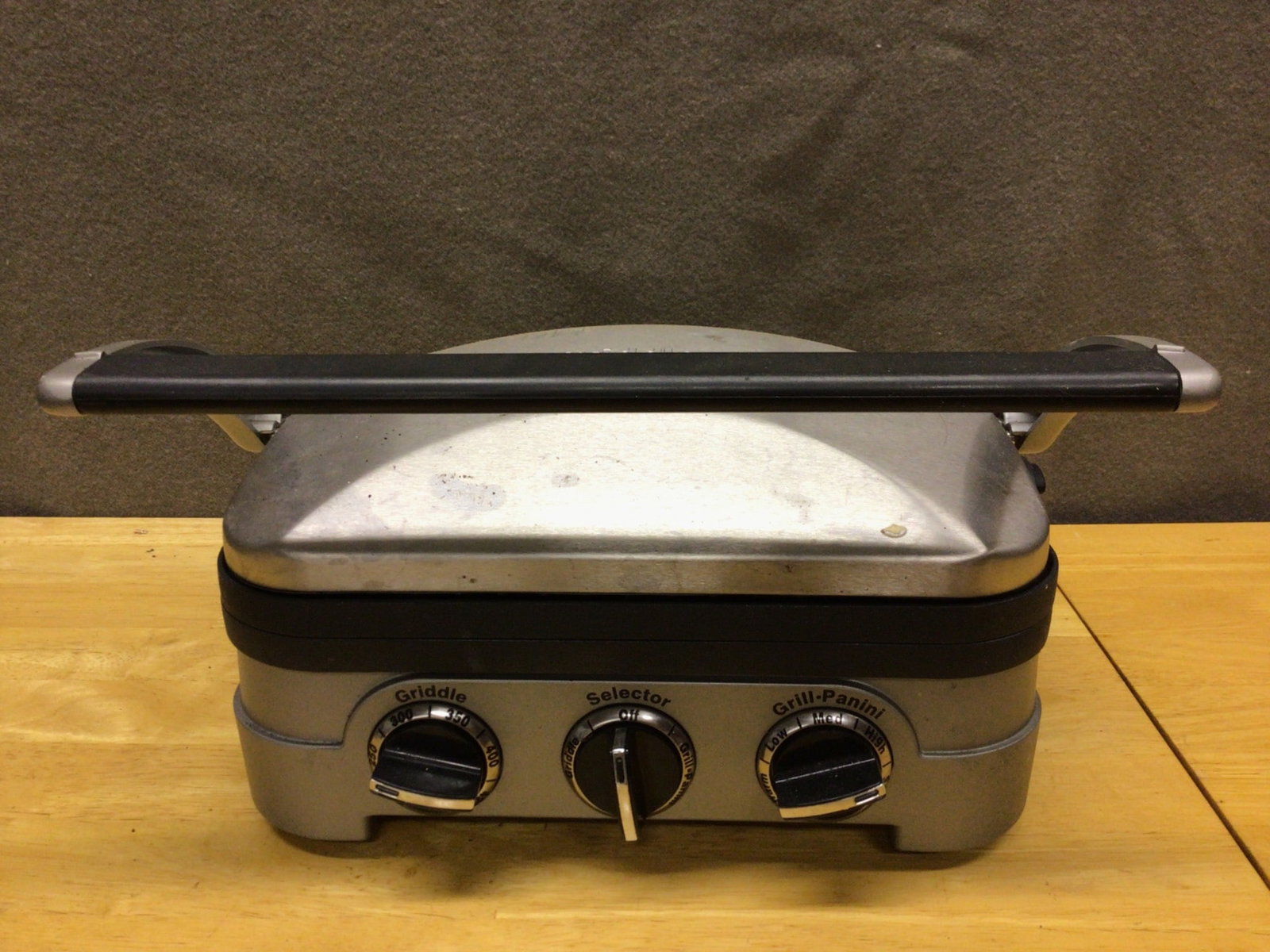 Cuisinart Griddler GR-4N 5-in-1 Countertop Grill: This is a Cuisinart Griddler model GR-4N, offering 5 functions: contact grill, panini press, full griddle, full grill, and half grill/half griddle. Features adjustable temperature controls with