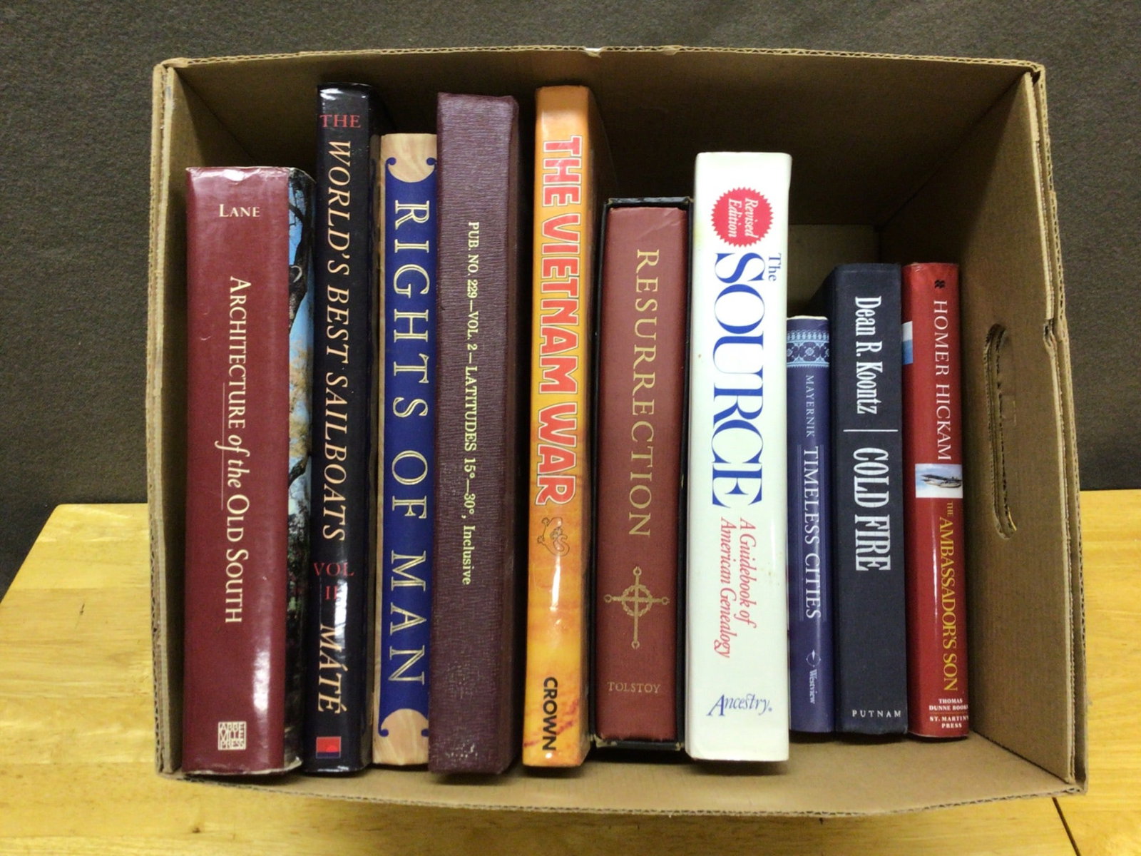 Box Lot of 10 Assorted Hardcover Books on History, Literature, and Genealogy: This lot includes 10 hardcover books: 'Architecture of the Old South, Vol. II', 'World's Best Sailboats, Vol. II', 'Rights of Man' by Thomas Paine, 'To Have and to Hold', Latitude 15' by Herb Payson, 