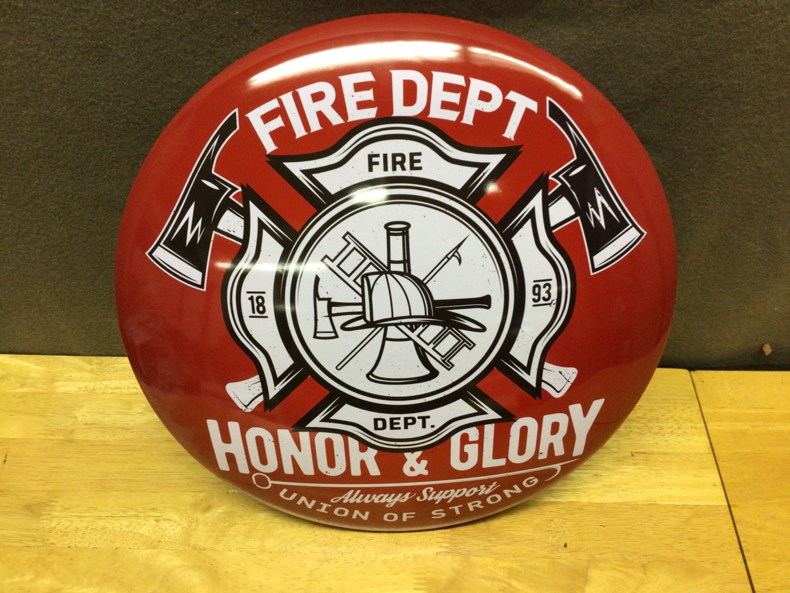 Fire Dept 'Honor & Glory' Decorative Wall Plaque, 18-Inch Diameter: This decorative wall plaque features a Fire Dept emblem with the wording 'Honor & Glory,' depicting firefighting tools and symbols. It measures approximately 18 inches in diameter, as shown in the